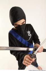 Man Young Athletic Fighting with sword Standing poses Casual Asian